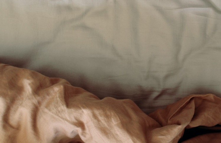 brown-blanket-with-mattress
